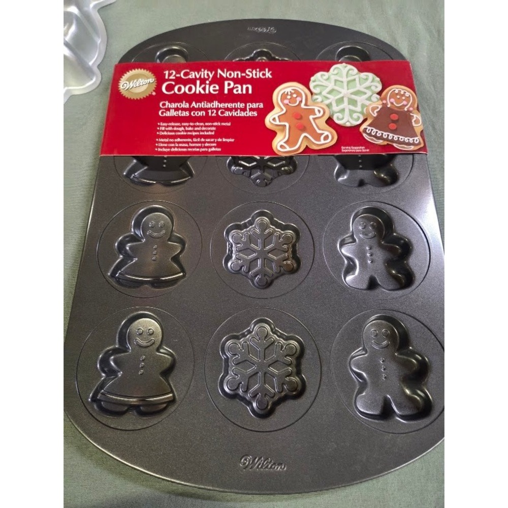 Wilton 12-Cavity Non-Stick Cookie Pan Gingerbread Man Snowflake Holiday Baking
